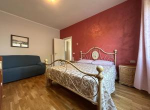 Postel nebo postele na pokoji v ubytování La Casa di Raffi