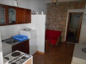 Kuchyň nebo kuchyňský kout v ubytování Apartments Dunja Hvar + 37 fotografií