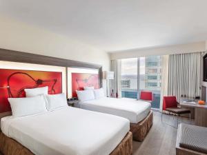 Postel nebo postele na pokoji v ubytování Novotel Wellington