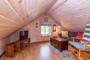 TV a/nebo společenská místnost v ubytování VAR100-Arjaeng