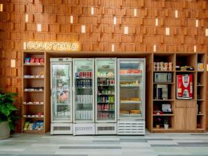 a store front of a store with its doors open at ibis budget Sao Paulo Paulista in Sao Paulo