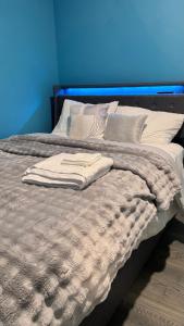 Postel nebo postele na pokoji v ubytování Temperly Heavon