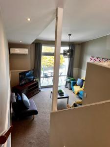 Posezení v ubytování Queenstown Apartment