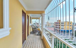 a balcony with a view of a building at Premium Single Room in Corales del Sur in La Viva