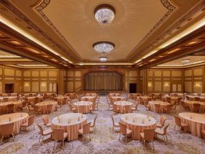 a large banquet hall with tables and chairs at Fairmont Grand Del Mar in San Diego +284 photos
