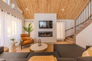 Χώρος καθιστικού στο Onyx - Spa Fire Pit and Forest View - Domaine du Grand Portneuf +25 φωτογραφίες