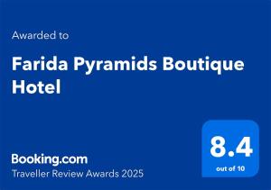 a blue sign with the words fanta pyramids boutique hotel at Farida Pyramid Boutique Hotel in Cairo +42 photos
