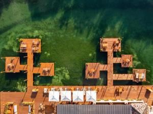 an aerial view of a house in the water at Fairmont Mayakoba in Playa del Carmen
