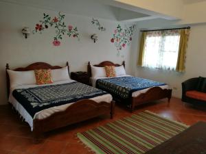 Letto o letti in una camera di Wishingwell B&B