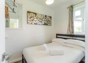 Meadow Lakes Holiday Parkにあるベッド