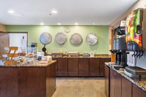 a bakery with a bunch of plates on the wall at GreenTree Suites Eagle / Vail Valley in Eagle