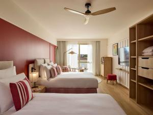 Ένα ή περισσότερα κρεβάτια σε δωμάτιο στο Le Talaia Hôtel & Spa Biarritz - MGallery Collection