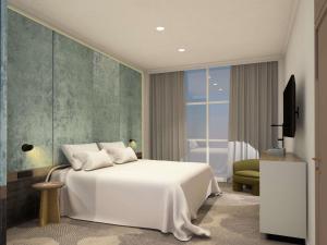 Postel nebo postele na pokoji v ubytování Hotel Lycium Debrecen - Handwritten Collection