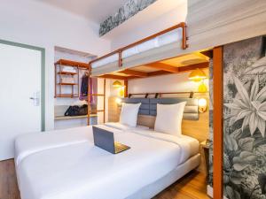 Ένα ή περισσότερα κρεβάτια σε δωμάτιο στο Hotel Siru Brussels