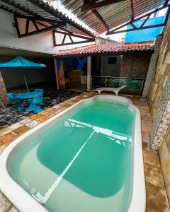 Swimmingpoolen hos eller tæt på Motel Emoções (Adults Only) + 17 billeder