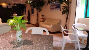 Posezení v ubytování Paradise Inn