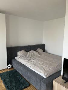 Ένα ή περισσότερα κρεβάτια σε δωμάτιο στο Cosy Flat in Vienna