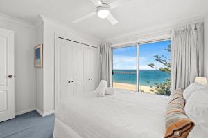 Ένα ή περισσότερα κρεβάτια σε δωμάτιο στο Forresters Dunes - Upstairs