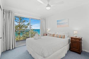 Giường trong phòng chung tại Forresters Dunes - Whole House