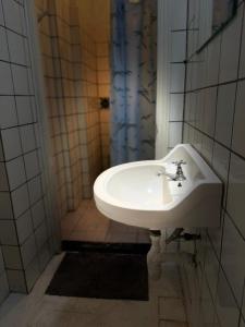 Koupelna v ubytování HouseCheconquista + 12 fotografií