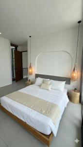 Ένα ή περισσότερα κρεβάτια σε δωμάτιο στο Senada Garden