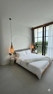 Ένα ή περισσότερα κρεβάτια σε δωμάτιο στο Senada Garden