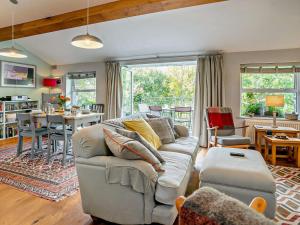 a living room with a couch and a table at 2 Bed in Brecon Town BN140 in Brecon