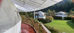 a view of a house from a balcony at Cinco Elementos in El Peñol