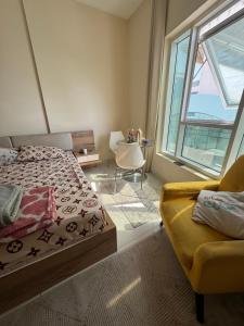 Ένα ή περισσότερα κρεβάτια σε δωμάτιο στο Tiger 4