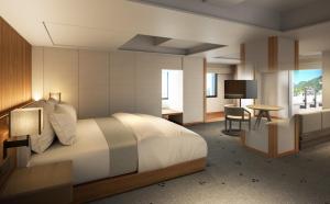 una camera d'albergo con un letto e una scrivania di 帝国ホテル 京都 a Kyoto