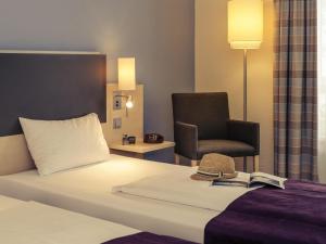 Ένα ή περισσότερα κρεβάτια σε δωμάτιο στο Mercure Hotel Berlin City West +83 φωτογραφίες