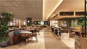 a restaurant with tables and chairs and a bar at Grand Mercure Kuala Lumpur Bukit Bintang in Kuala Lumpur +25 photos