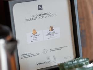 a computer screen with a sign that says cats suspected polymermalignedroteinactoractor at Nest Hotel Paris la Défense - MGallery Collection in Puteaux