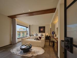 Posezení v ubytování Shaxi Courtyard Village Holiday B&B