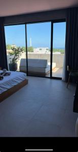 Ένα ή περισσότερα κρεβάτια σε δωμάτιο στο Tulum Villa Pandawa Melasti