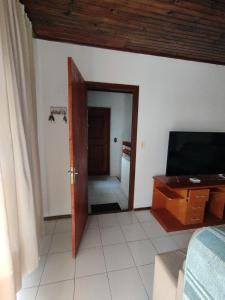 TV a/nebo společenská místnost v ubytování Rivera,moderno,luminoso,2 dor mitorios