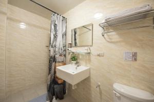 Ένα μπάνιο στο Cozy Guesthouse
