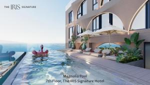 Bazén v ubytování The IRIS SIGNATURE HOTEL AND SPA nebo v jeho okolí