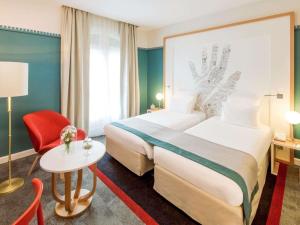 Ένα ή περισσότερα κρεβάτια σε δωμάτιο στο Mercure Lyon Centre Château Perrache +134 φωτογραφίες