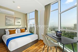 Ένα ή περισσότερα κρεβάτια σε δωμάτιο στο Senvin by Kozystay - Alam Sutera +21 φωτογραφίες