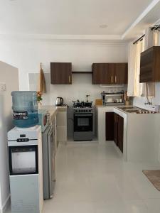 Dapur atau dapur kecil di Boho Comfort Homes
