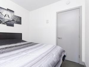 Ένα ή περισσότερα κρεβάτια σε δωμάτιο στο Saltwind Stay