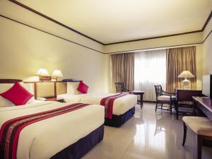 Katil atau katil-katil dalam bilik di Mercure Chiang Mai
