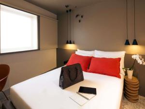 Postel nebo postele na pokoji v ubytování Mercure Porto Centro Santa Catarina + 153 fotografií