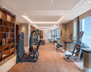a gym with treadmills and exercise equipment in a hotel at Hyatt House Chengdu Pebble Walk in Chengdu