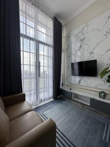 Fotografie z fotogalerie ubytování Inapstay - Villa Aura Puncak Landungsari v destinaci Dau