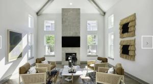 a living room with white walls and a fireplace at Landing Amazing 1BD Clubhouse Pool in Oxford