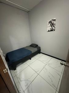 Ένα ή περισσότερα κρεβάτια σε δωμάτιο στο Hostal Arteaga