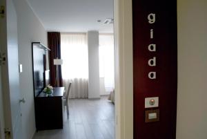 TV a/nebo společenská místnost v ubytování Galileo B&B