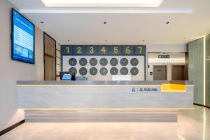 Zona de hol sau recepție la 7 Days Inn Qingdao Liaoyang West Road Xinye Plaza Metro Station